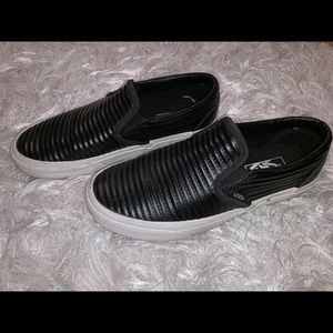 Black leather vans